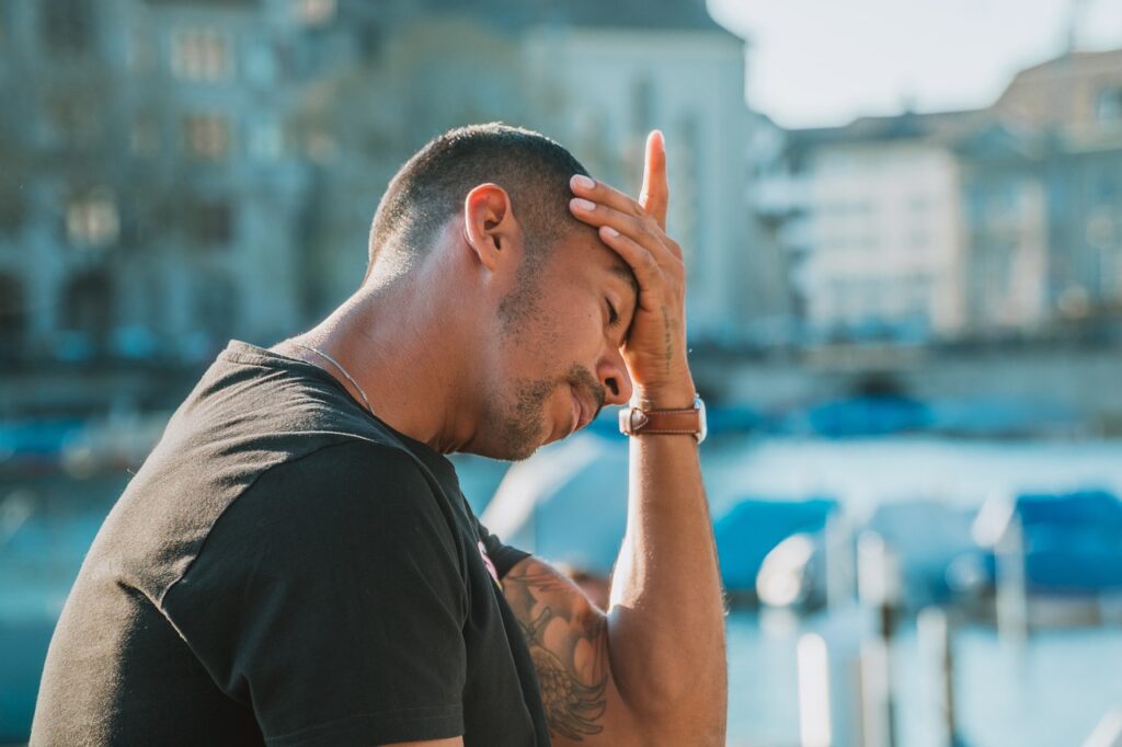 A man stressed out reflecting on why no one listens to him.