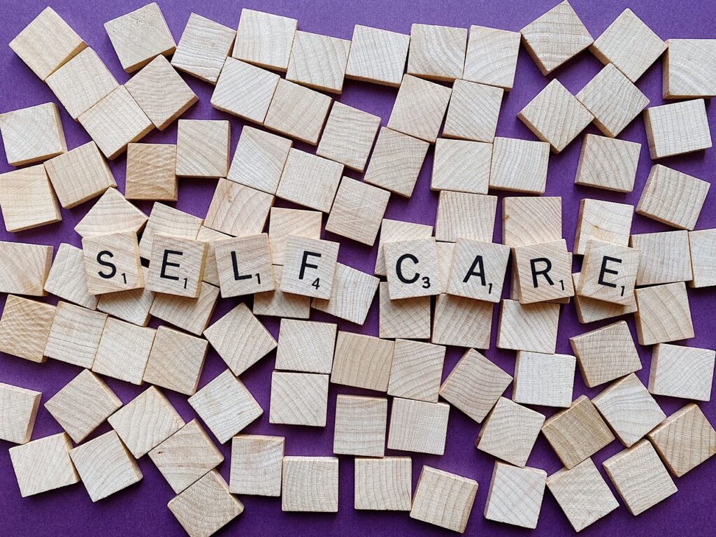 A picture with the words self care written on it. Stop losing yourself